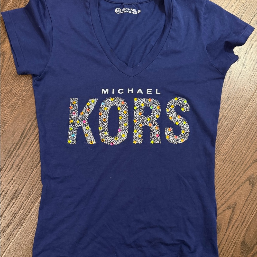 Michael Kors Blue Tee with Floral Logo. Never worn